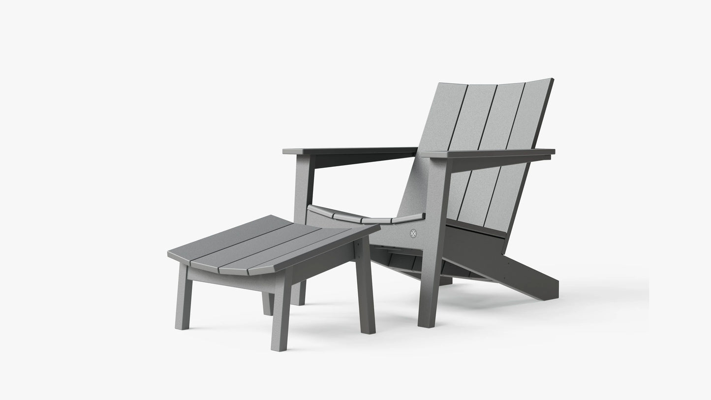 Ascent Adirondack chair in Gray with matching ottoman – left angle outdoor lounge seating